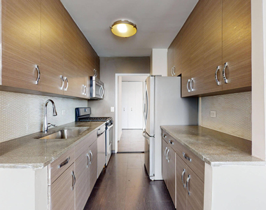 401 E 34th St - Photo Thumbnail 1