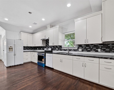 7030 Sidney Street - Photo Thumbnail 11