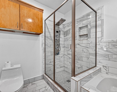 7030 Sidney Street - Photo Thumbnail 17