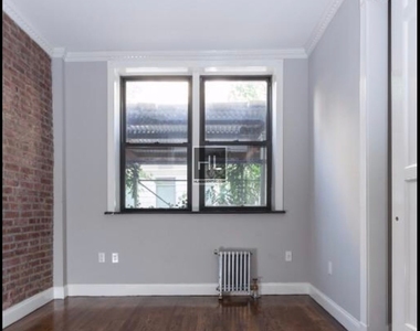 E 100th St. - Photo Thumbnail 1