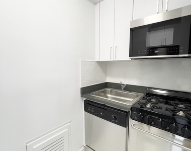 East 35 Street - Photo Thumbnail 2