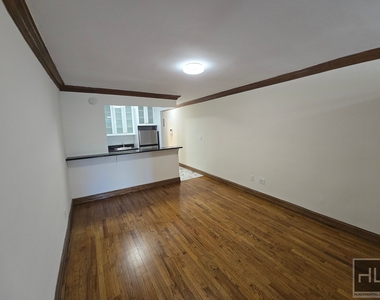 East 36 Street - Photo Thumbnail 2