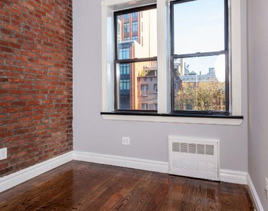 W 14th St. - Photo Thumbnail 1