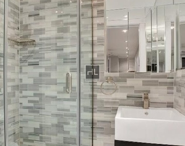 W 52nd St. - Photo Thumbnail 7