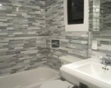 W 52nd St. - Photo Thumbnail 6