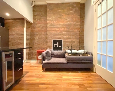 W 21st St. - Photo Thumbnail 3
