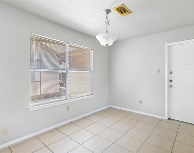 7310 Maple Walk Drive - Photo Thumbnail 1
