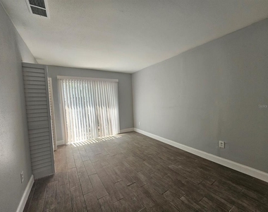 7602 W Powhatan Avenue - Photo Thumbnail 9