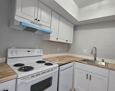 7602 W Powhatan Avenue - Photo Thumbnail 2
