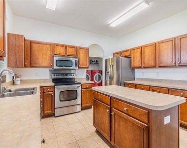 8219 Canterbury Lake Boulevard - Photo Thumbnail 4