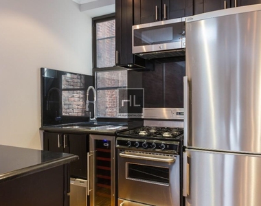 W 52nd St. - Photo Thumbnail 1
