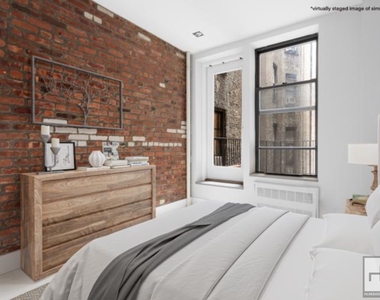Stanton Street - Photo Thumbnail 1