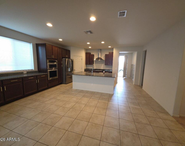 16416 W Cottontail Lane - Photo Thumbnail 3