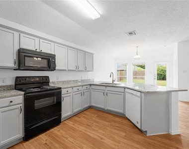 9825 Tyler Drive - Photo Thumbnail 2