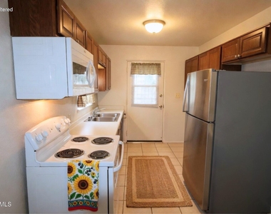 1006 N Pueblo Drive - Photo Thumbnail 2