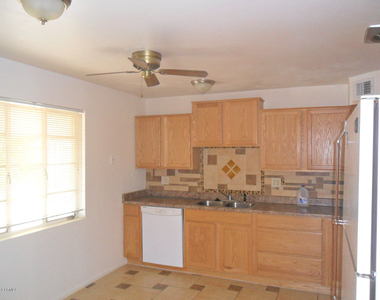 11356 N 113th Avenue - Photo Thumbnail 3