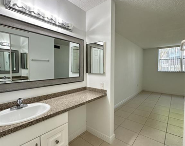 9401 Lime Bay Boulevard - Photo Thumbnail 13