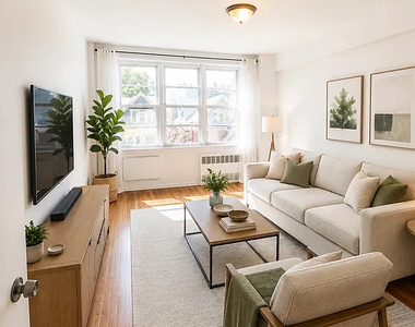 87-17 Dumont Avenue - Photo Thumbnail 1