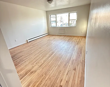 87-17 Dumont Avenue - Photo Thumbnail 2