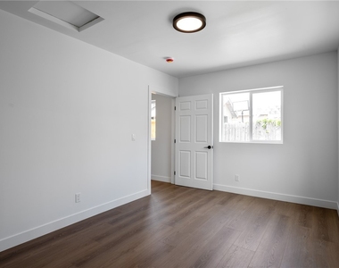 745 1/2 W 106th Street - Photo Thumbnail 3