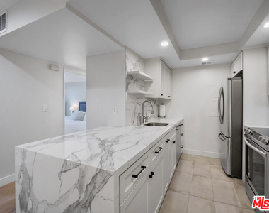 1134 Alta Loma Road - Photo Thumbnail 3