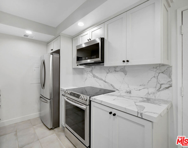 1134 Alta Loma Road - Photo Thumbnail 5
