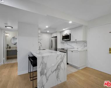 1134 Alta Loma Road - Photo Thumbnail 2