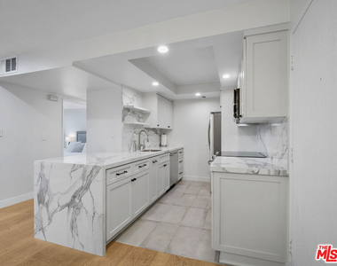 1134 Alta Loma Road - Photo Thumbnail 1