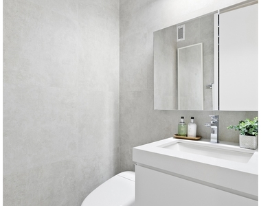 235 E 40th St - Photo Thumbnail 6