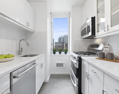 235 E 40th St - Photo Thumbnail 2