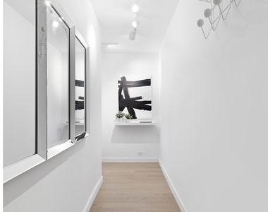 235 E 40th St - Photo Thumbnail 7