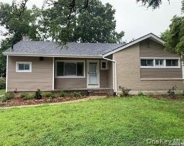 402 Leslie Lane - Photo Thumbnail 1