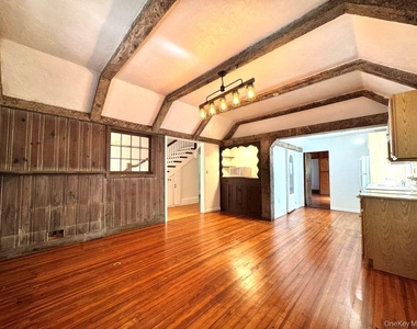 560 Taxter Road - Photo Thumbnail 2