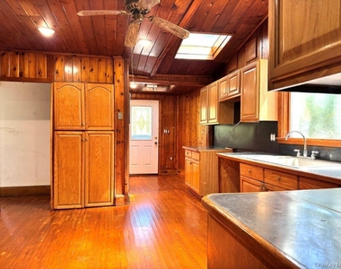 560 Taxter Road - Photo Thumbnail 7