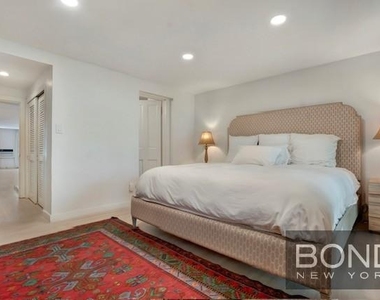 233 E 18th Street - Photo Thumbnail 7