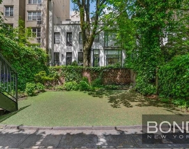 233 E 18th Street - Photo Thumbnail 12