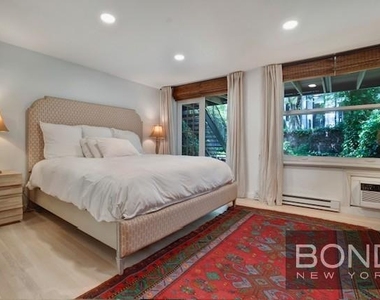 233 E 18th Street - Photo Thumbnail 6