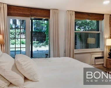 233 E 18th Street - Photo Thumbnail 9