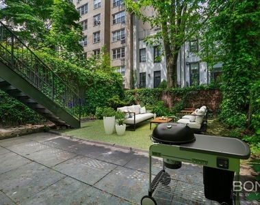 233 E 18th Street - Photo Thumbnail 10