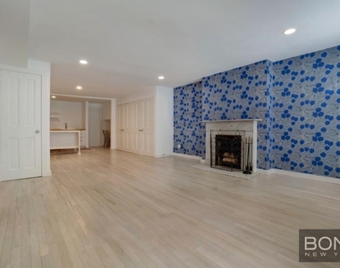 233 E 18th Street - Photo Thumbnail 4