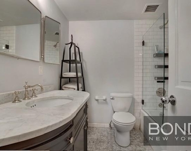 233 E 18th Street - Photo Thumbnail 13