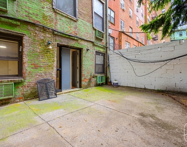 313 W 29th Street - Photo Thumbnail 13