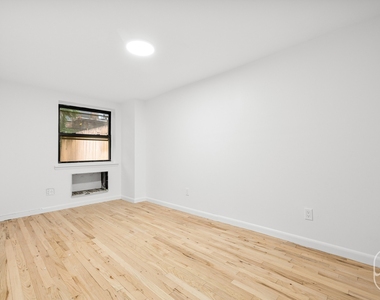313 W 29th Street - Photo Thumbnail 7