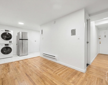 313 W 29th Street - Photo Thumbnail 4