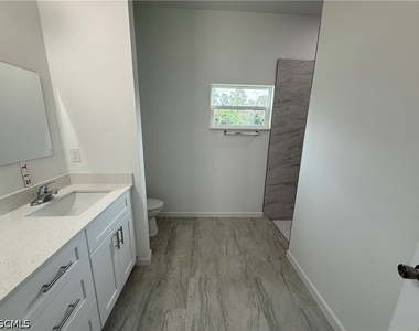 1103 W 10th Street - Photo Thumbnail 12