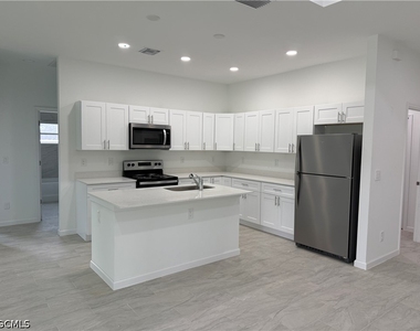 1103 W 10th Street - Photo Thumbnail 3