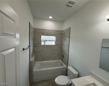 1103 W 10th Street - Photo Thumbnail 18