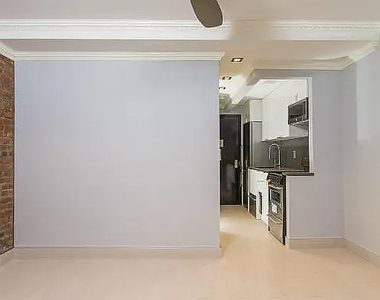 221 East 11th Street - Photo Thumbnail 4