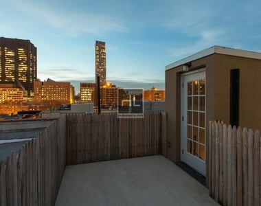 E 10th St. - Photo Thumbnail 4