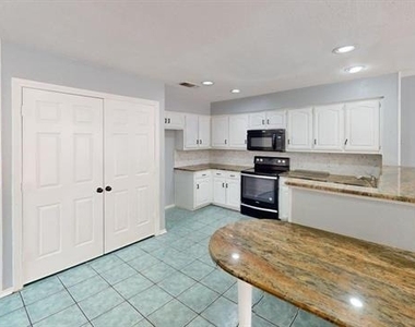9010 Cumberland Drive - Photo Thumbnail 4